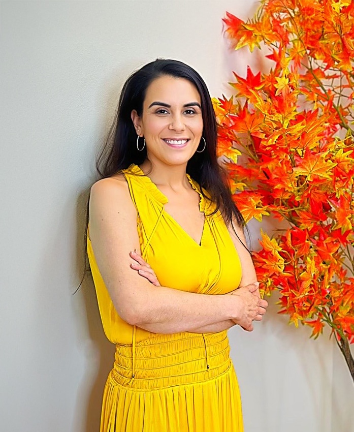 a woman wearing a colorful dress