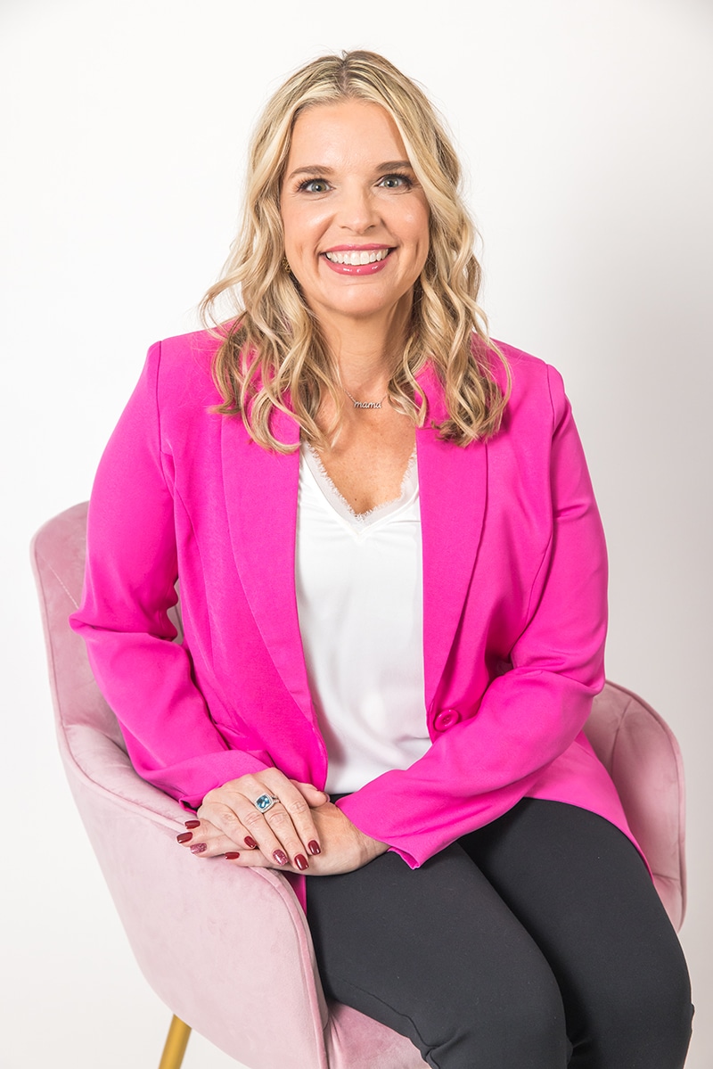 a woman in a pink shirt