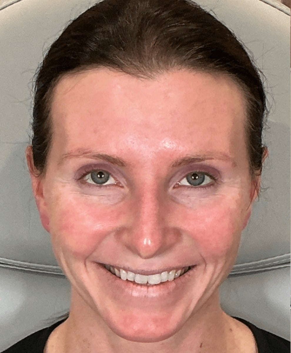 a man smiling for the camera